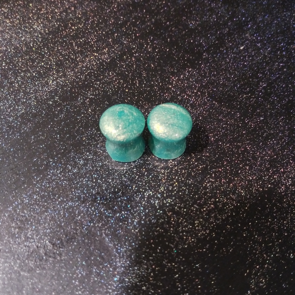 00g saddle flare plugs mermaid teal